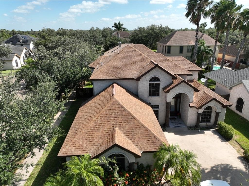 Finished roof replacement on a home in the Rio Grande Valley by Hidalgo Roofing