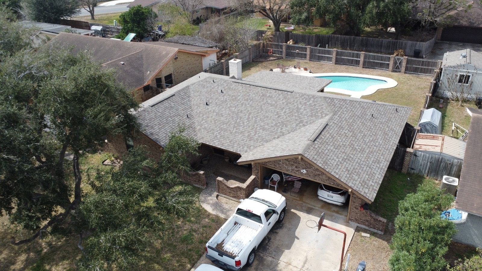 Aerial view of a residential shingle roof on a McAllen, Texas home
