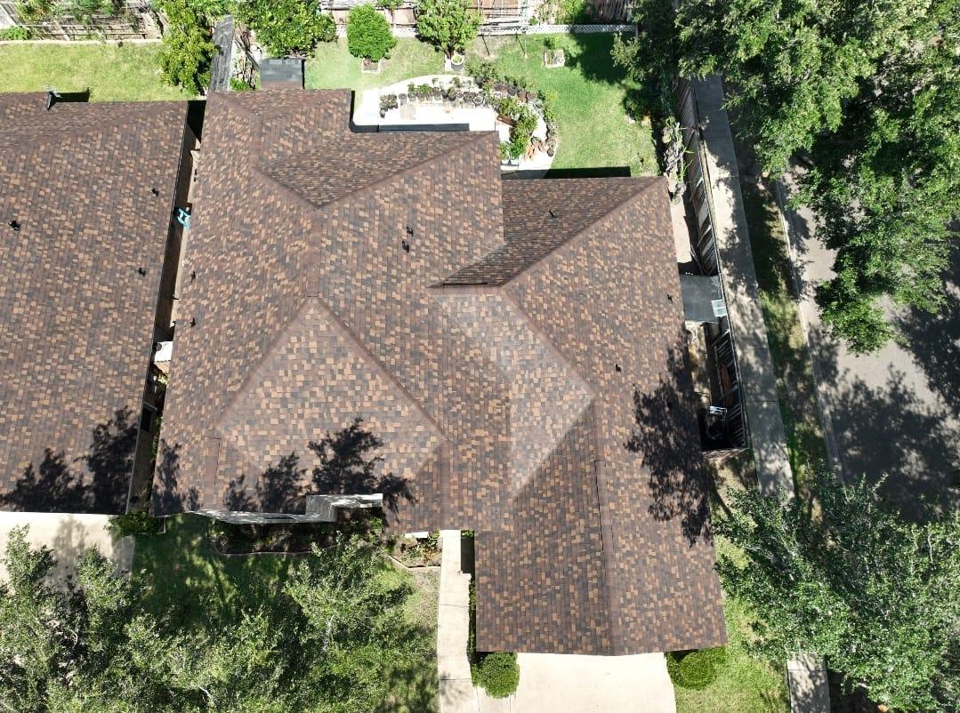 Completed residential shingle roof on a Mission, Texas home