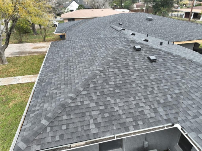 Completed residential shingle roof on an Edinburg, Texas home