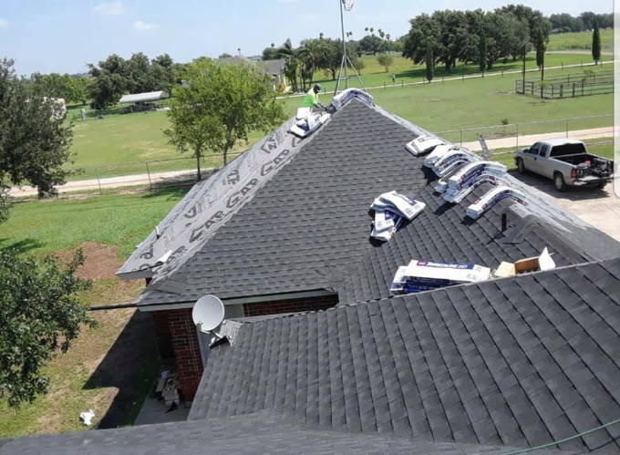 Hidalgo Roofing crew installing new shingles over fresh underlayment on a Rio Grande Valley home
