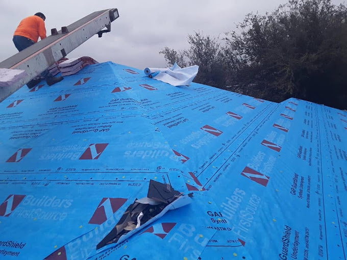 Roof repair in progress on a Mission, Texas residential roof